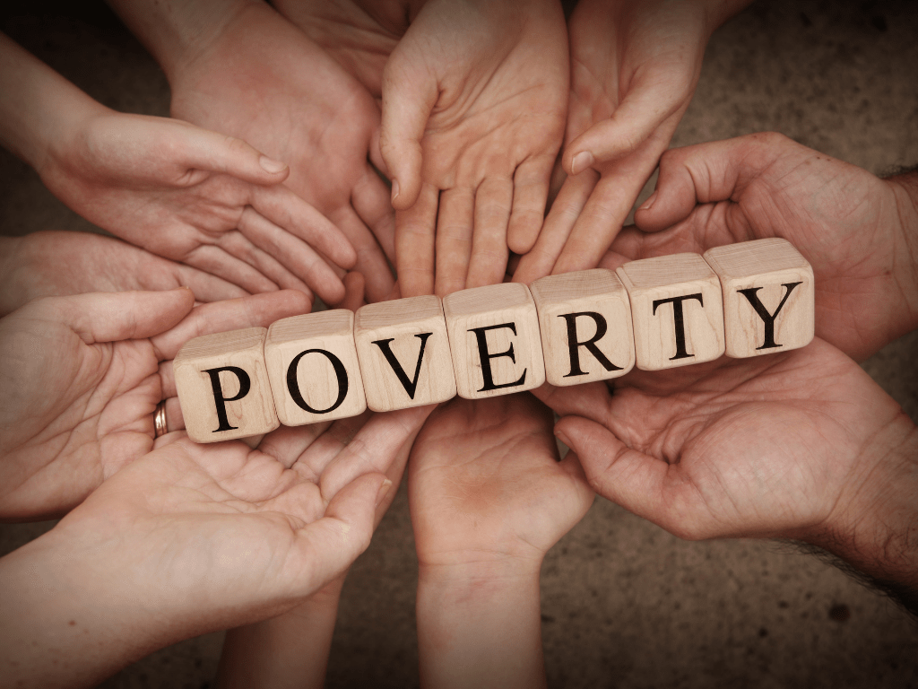 hands holding a poverty sign