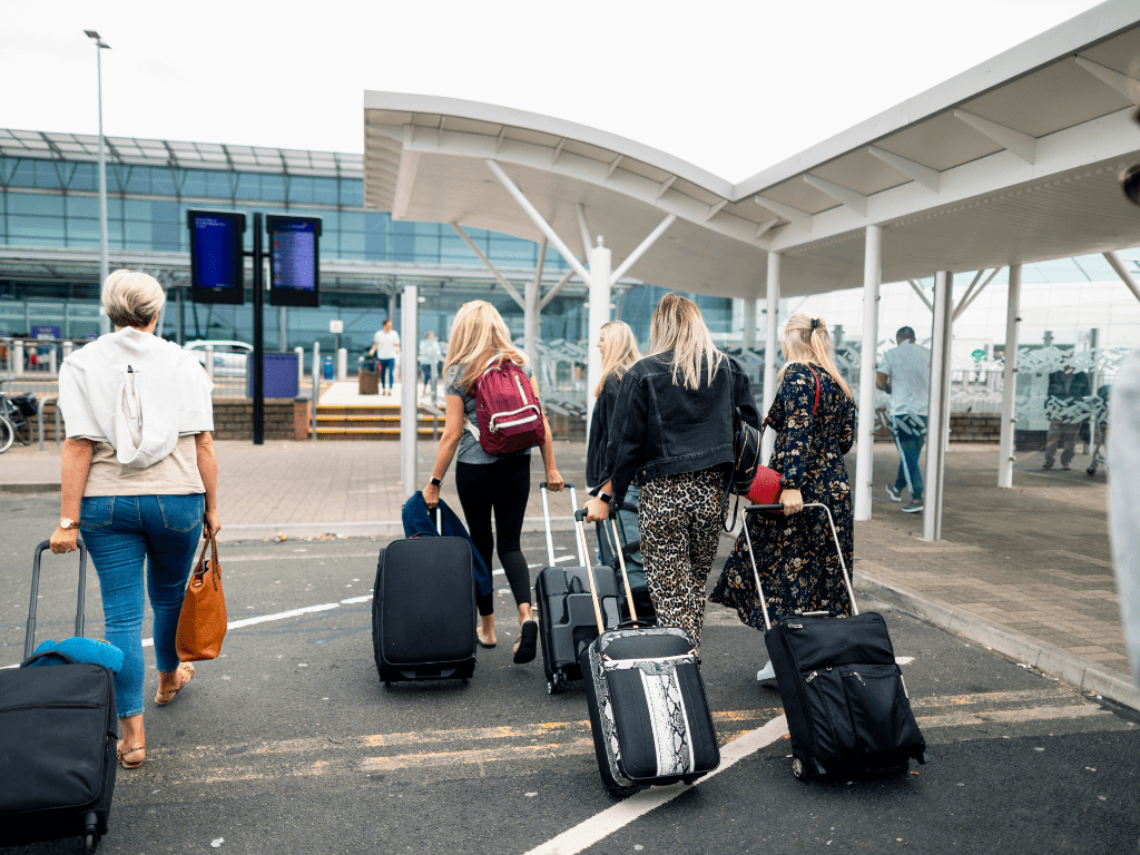 Vacationers arriving at an airport