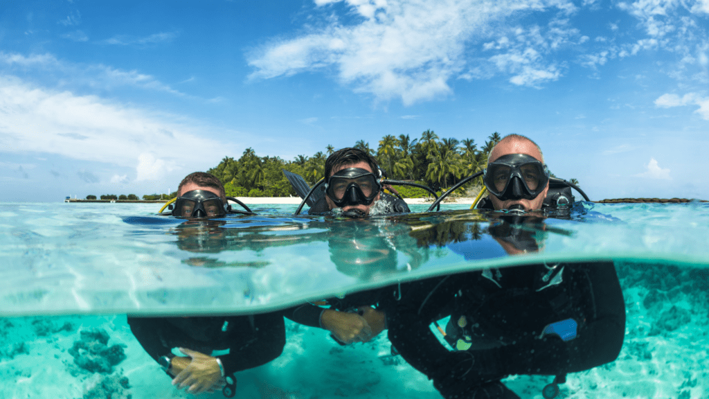 3 men scuba diving